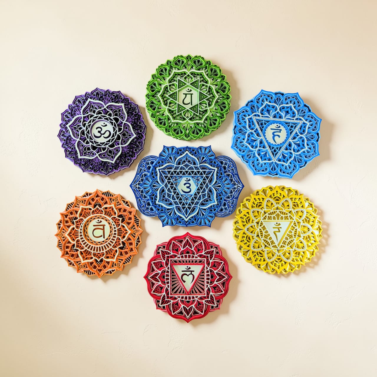7 Chakra Mandala Wall Art Set with seven colourful laser-cut chakra designs