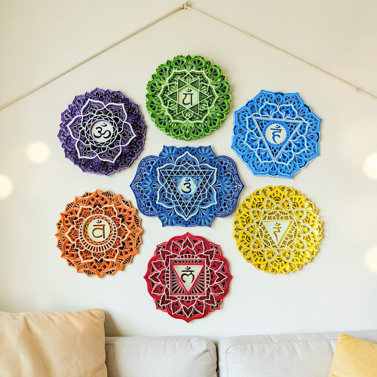 7 Chakra Mandala wall art set displayed in a meditation or yoga space